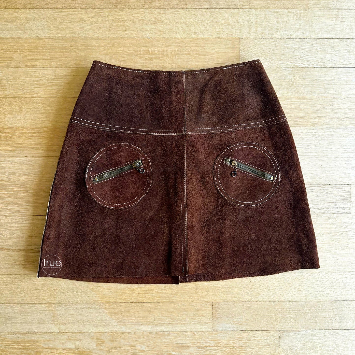 vintage 1960's suede mini skirt ...woodstock era chocolate leather suede topstitched circle pockets w/brass o-ring zippers